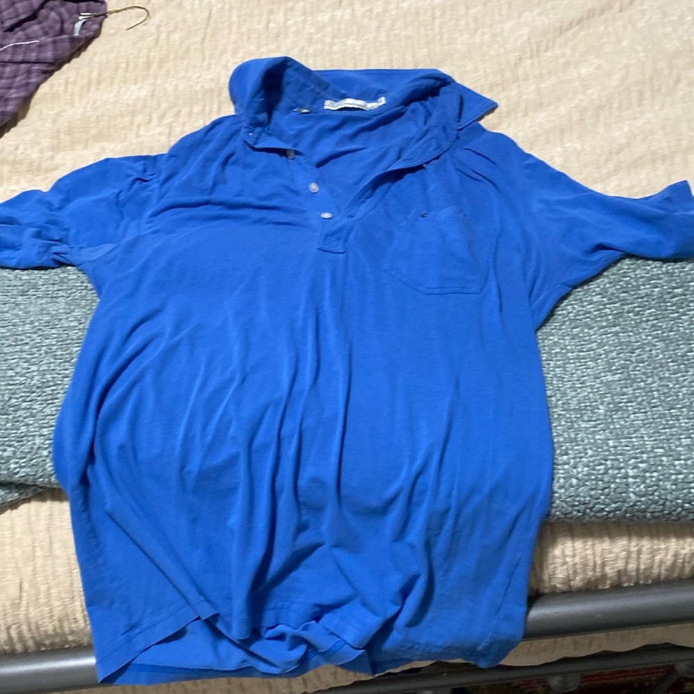 Used great condition blue medium criquet shirt